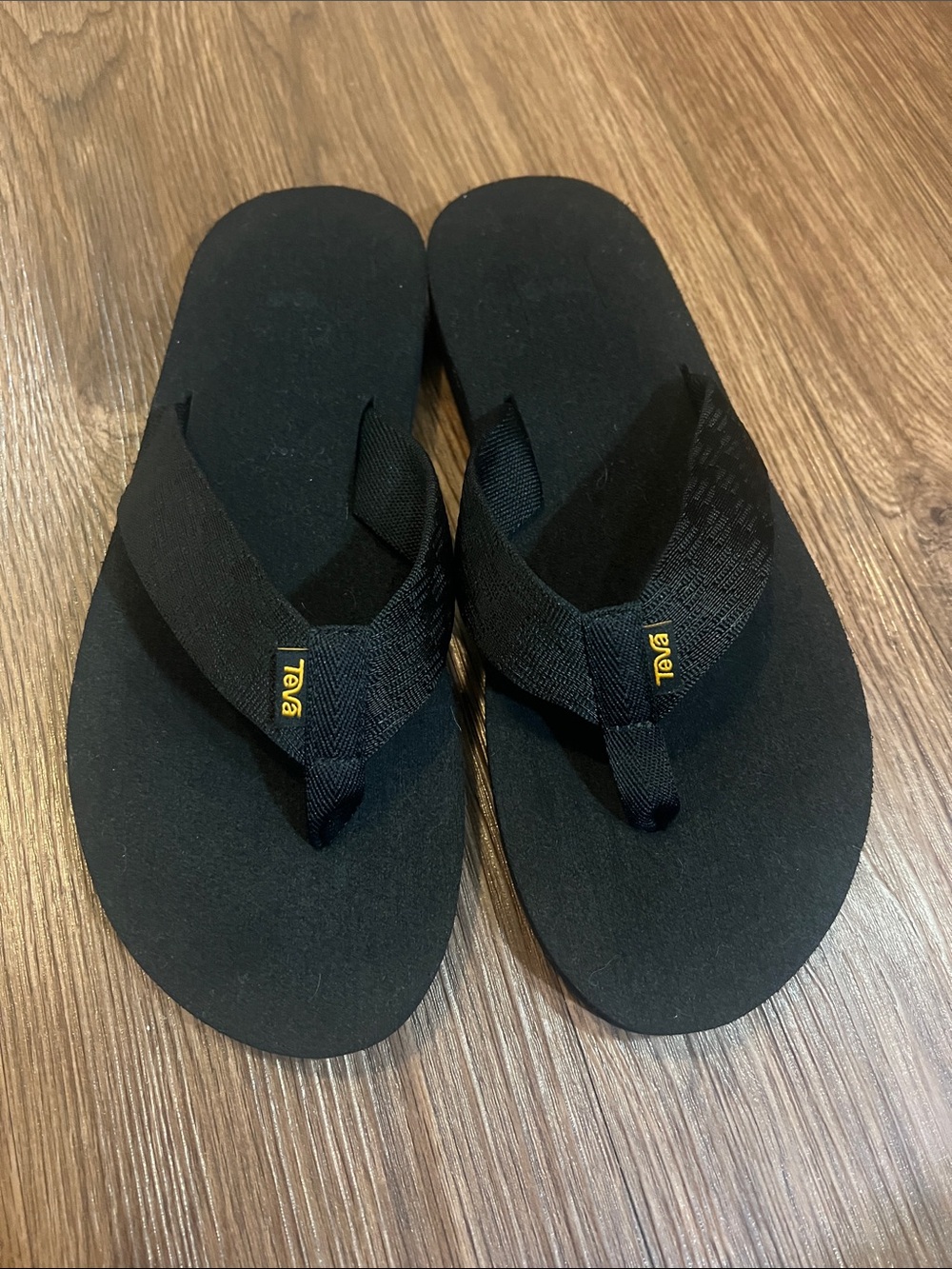 Teva Black Flip Flop Sandals with Yellow Logo Accent